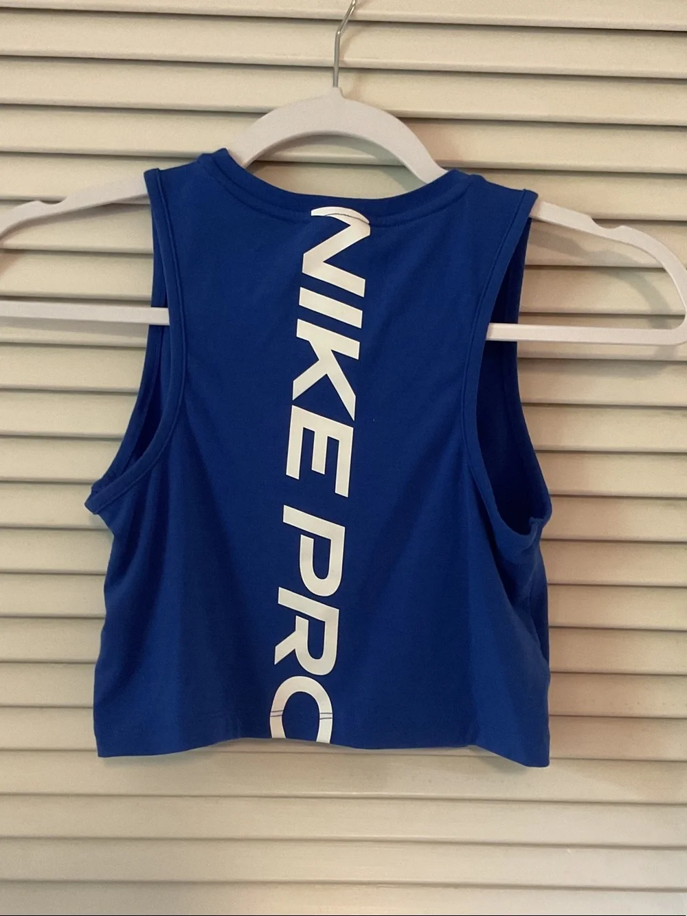 Kids size small Nike Royal Blue Cropped Tank with White Swoosh